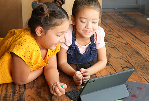 Parent working with children