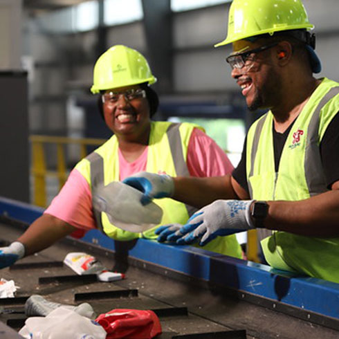 Employees going through recycling