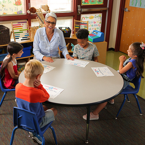 Teacher and students discussing