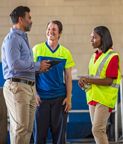 Businessman talking to Republic employees
